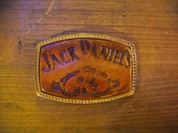 ジャックダニエルウイスキーの革製のバックル。